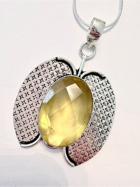 2 inch, 925 marked , butterfly shaped, Citrine  pendant on a silver chain.
